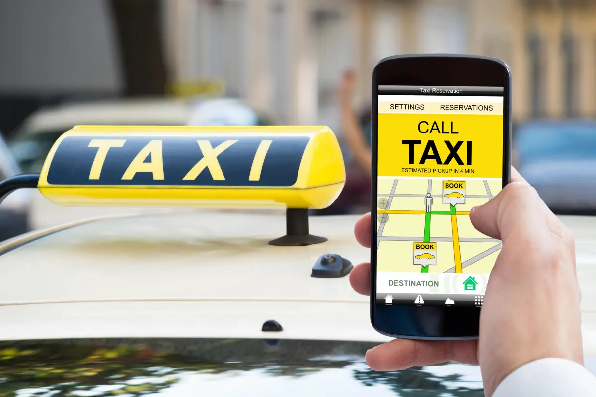Passenger booking an Excel Taxi Yeovil ride on a mobile phone
