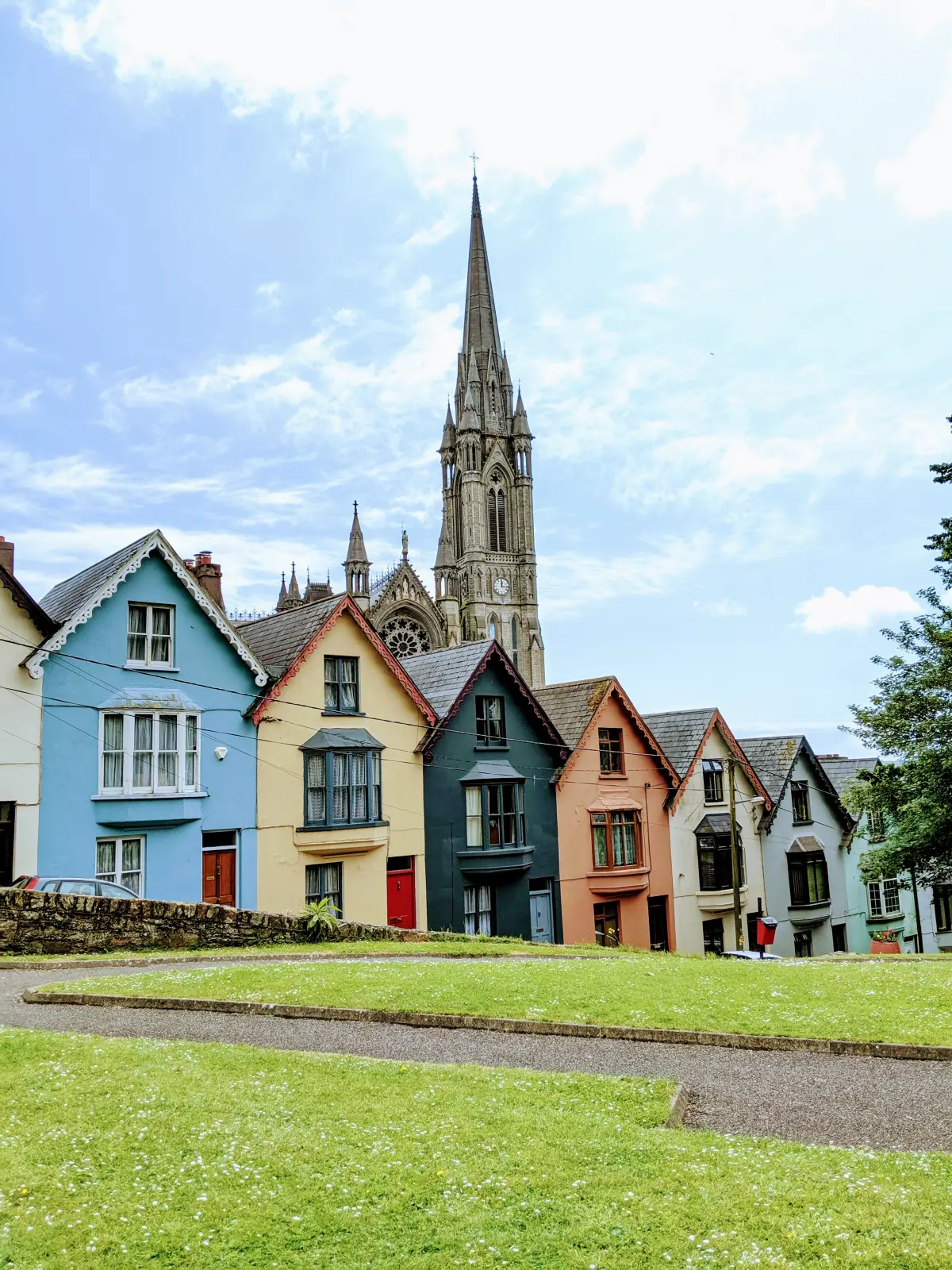 Row of town houses with a church in the Crewkerne area served by Excel Taxi